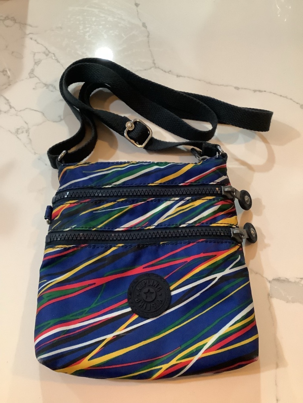 Kipling Small Multicolor Stripe Crossbody Bag with Black Strap
